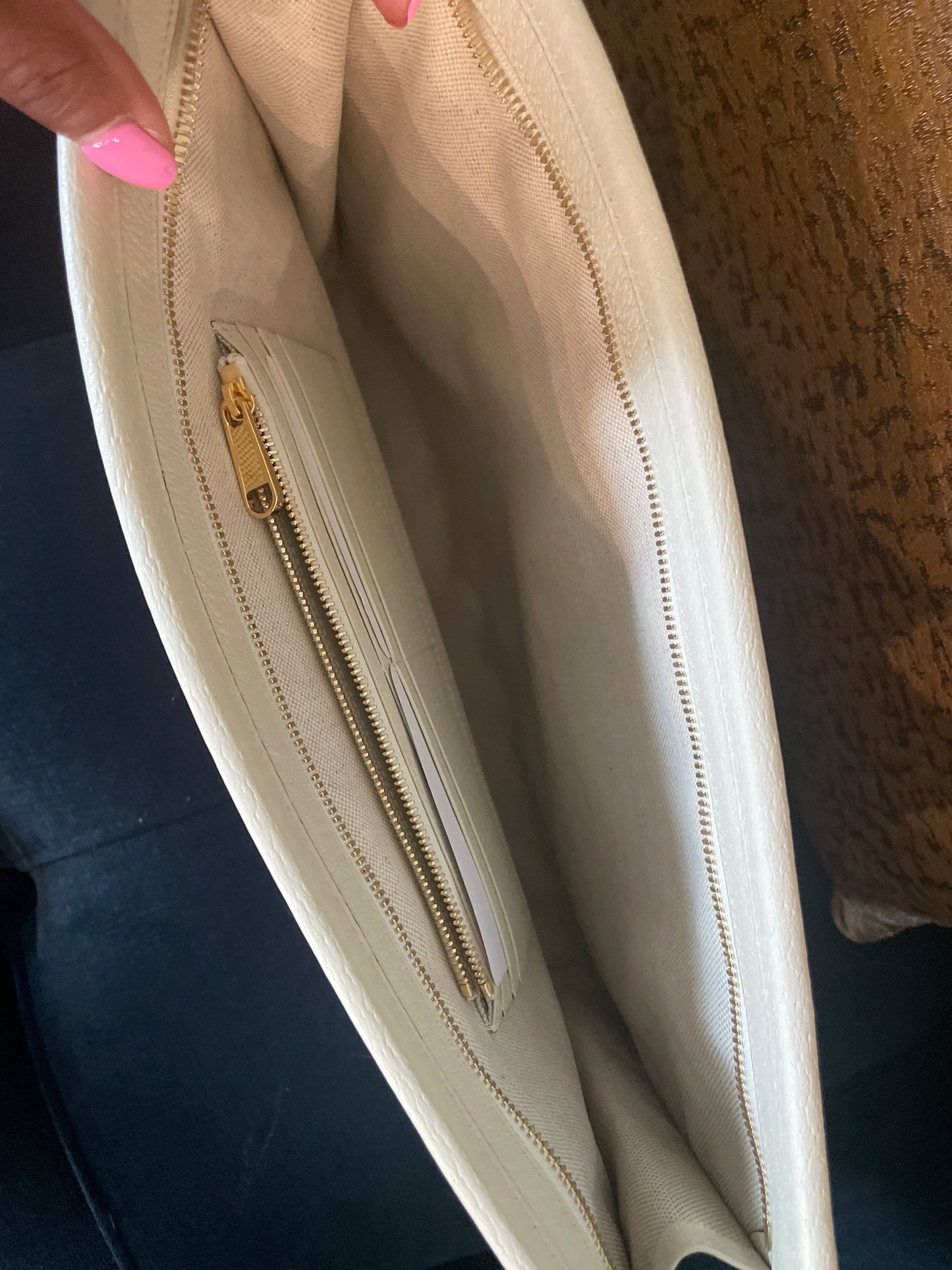 Beautiful Montecarlo pouch/clutch featuring a bold red, blue, and white GG geometric monogram pattern with cream trim and a brown leather Montecarlo logo patch.